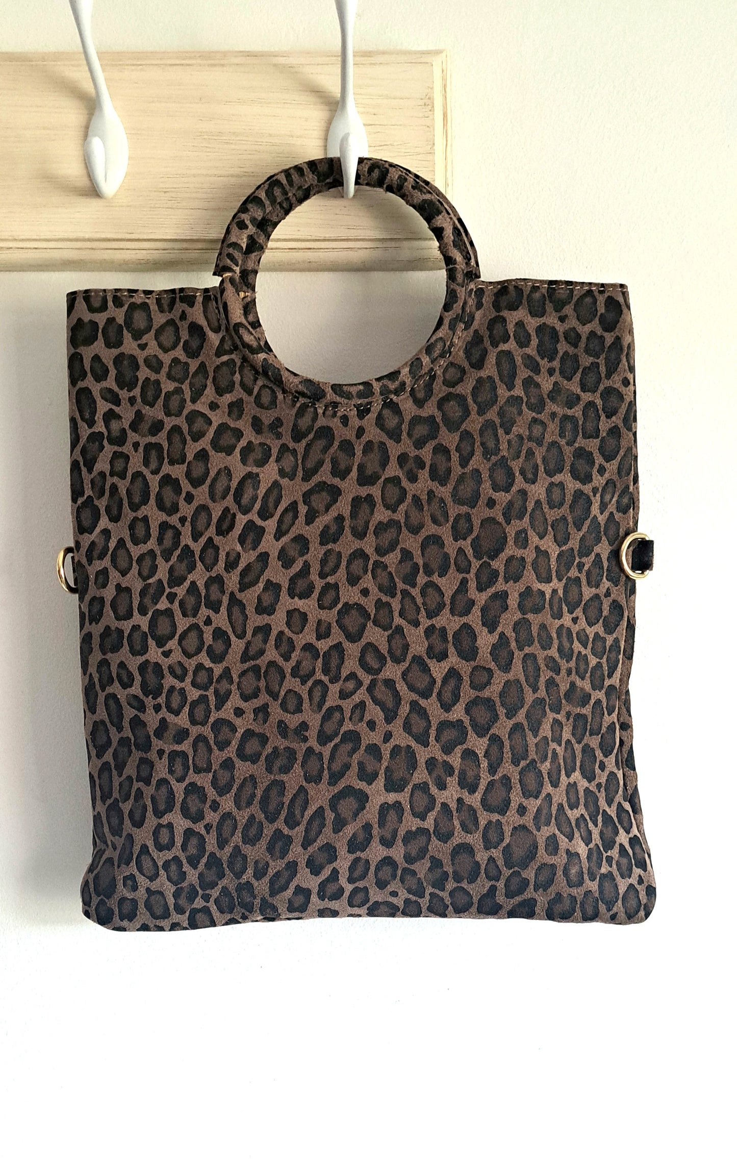 Convertible handbag into animal print shoulder bag