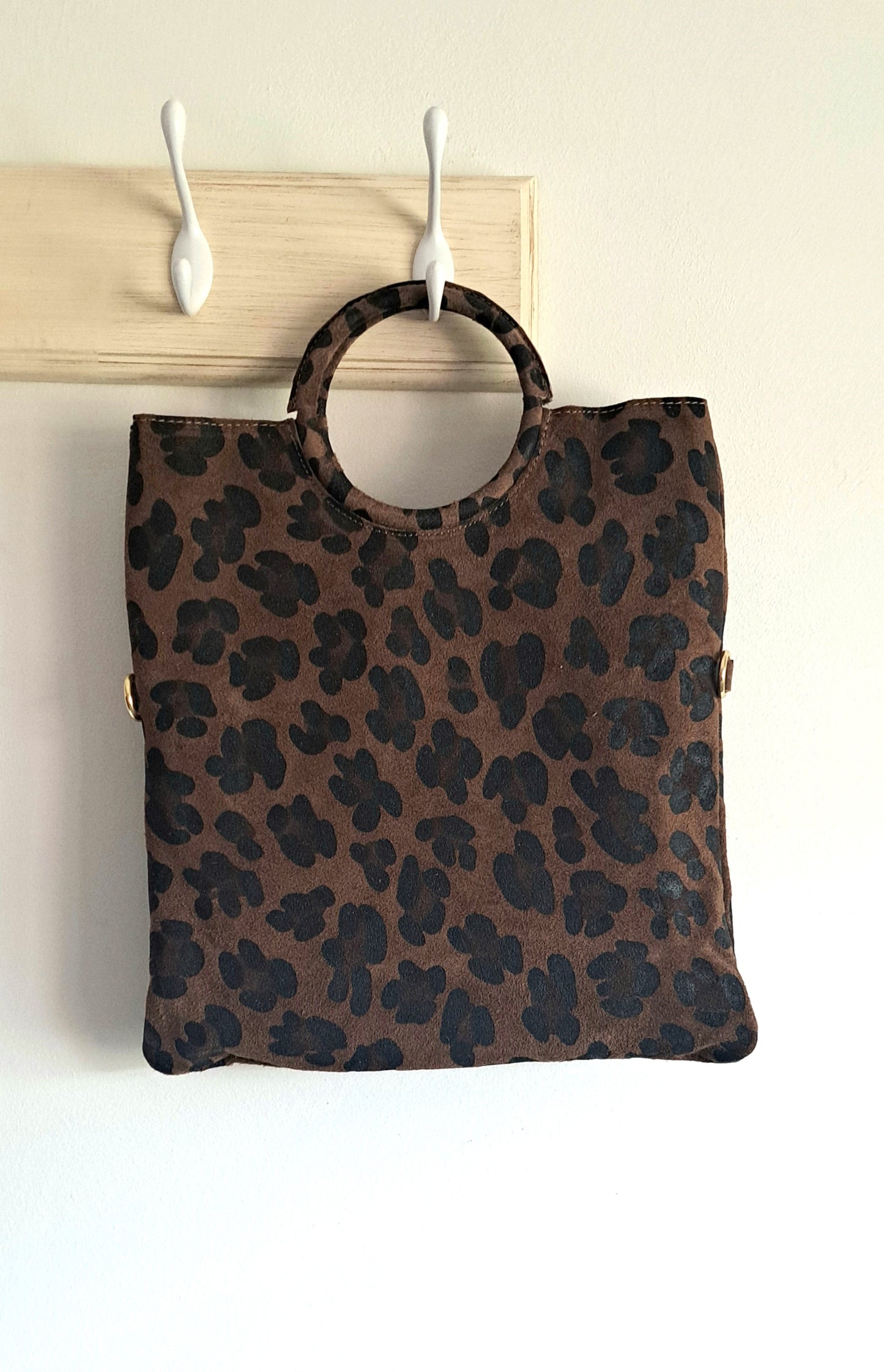 Convertible handbag into animal print shoulder bag