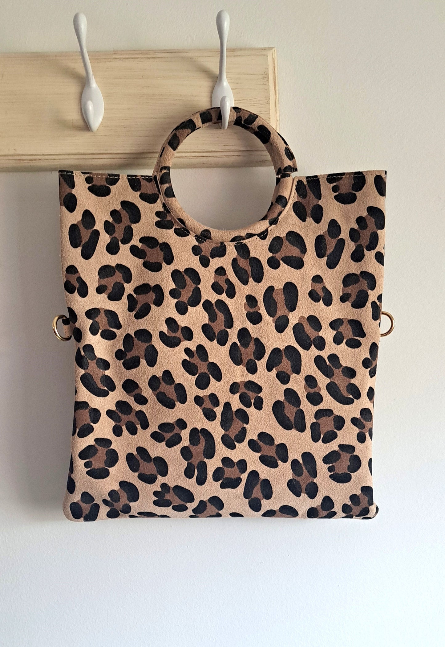 Convertible handbag into animal print shoulder bag