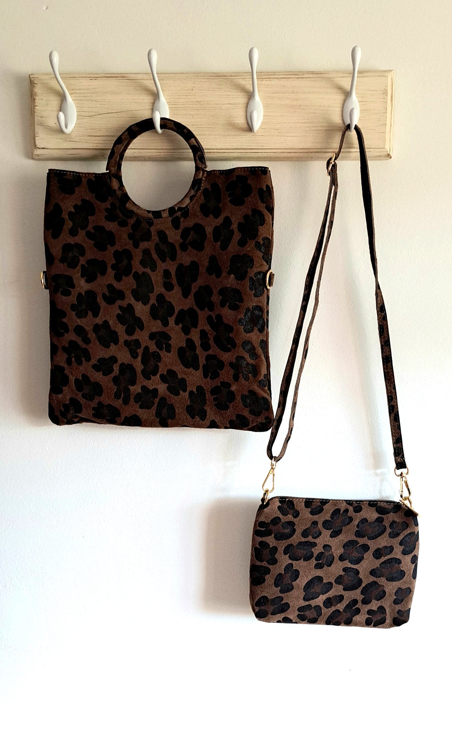 Convertible handbag into animal print shoulder bag