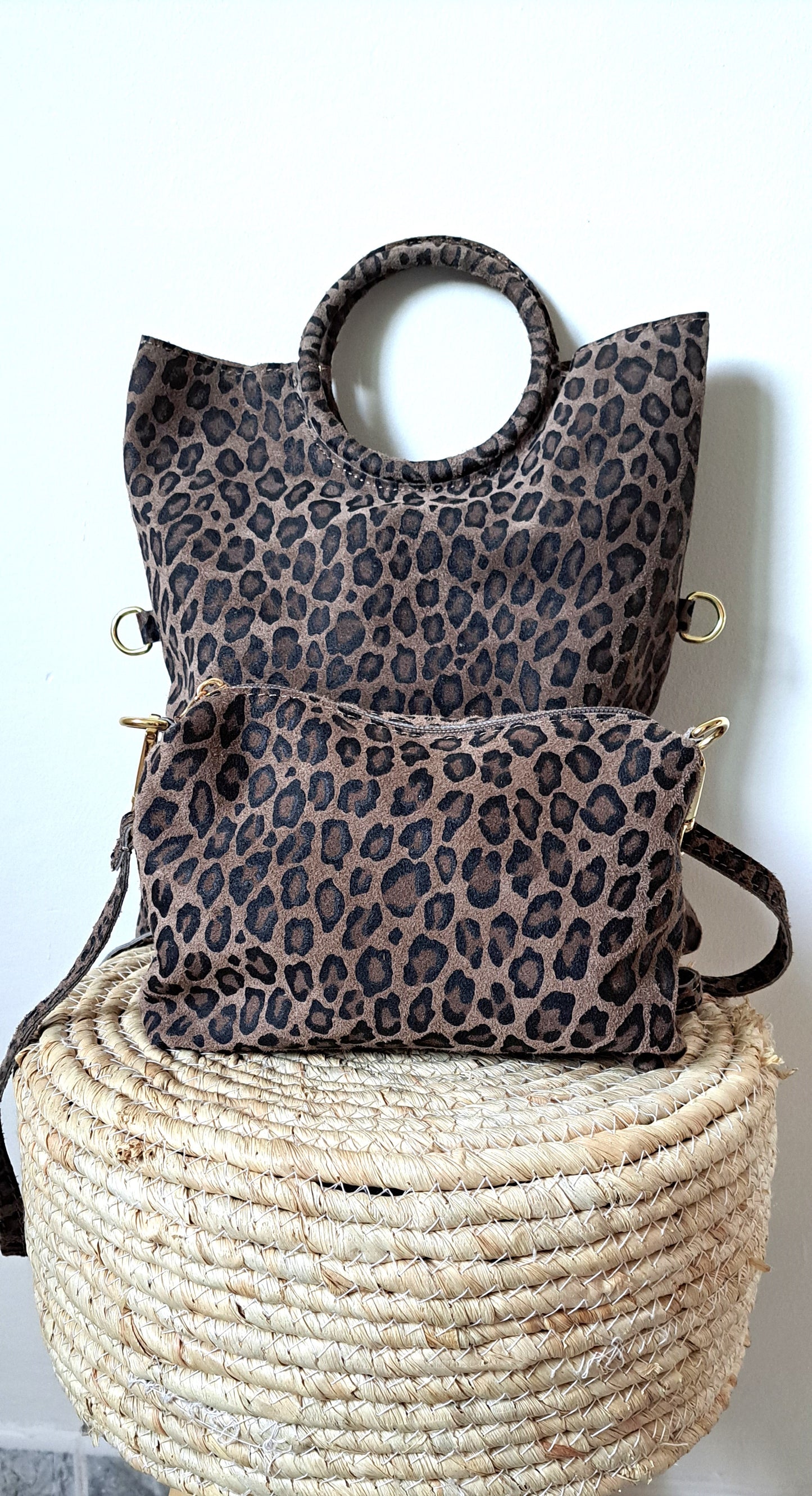 Convertible handbag into animal print shoulder bag