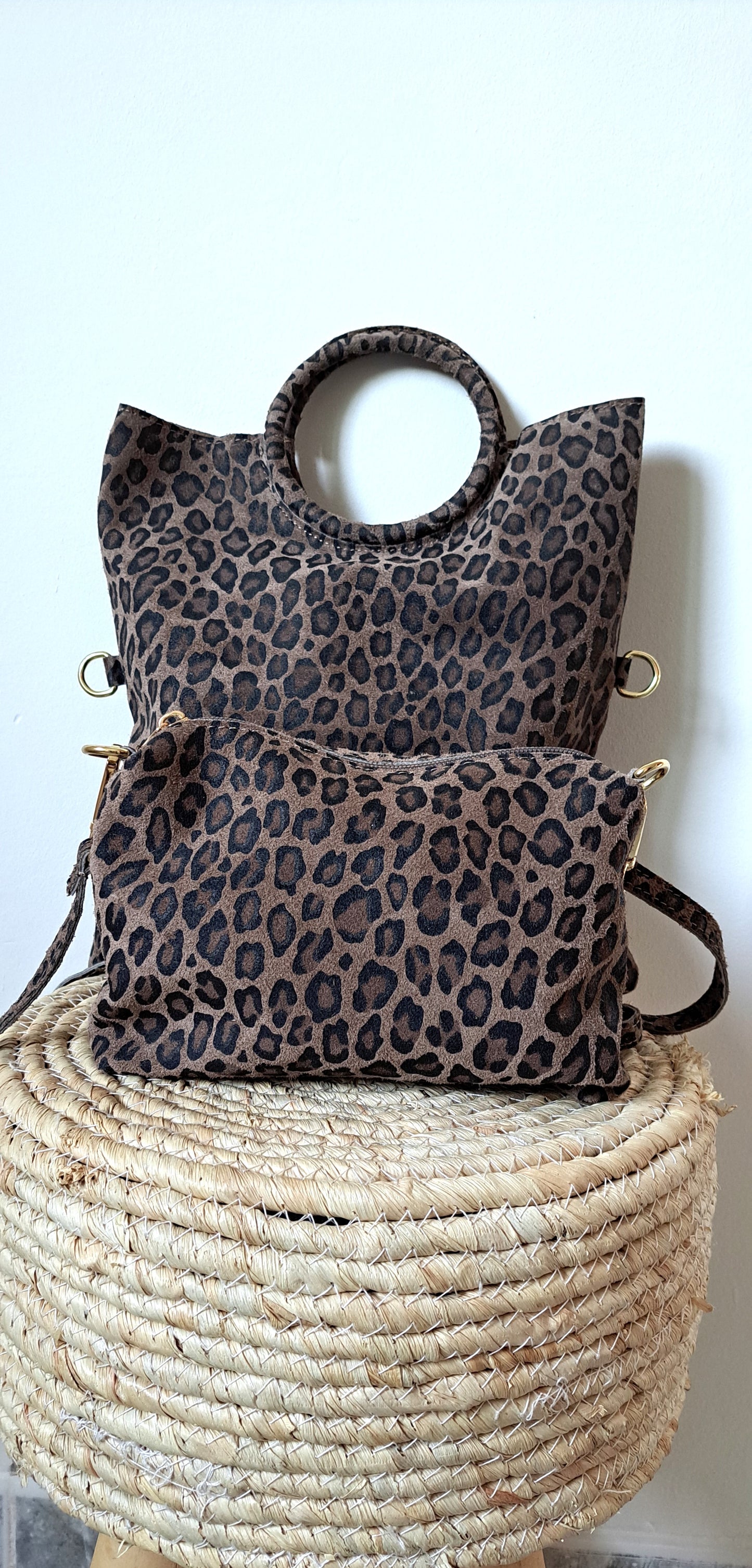 Convertible handbag into animal print shoulder bag