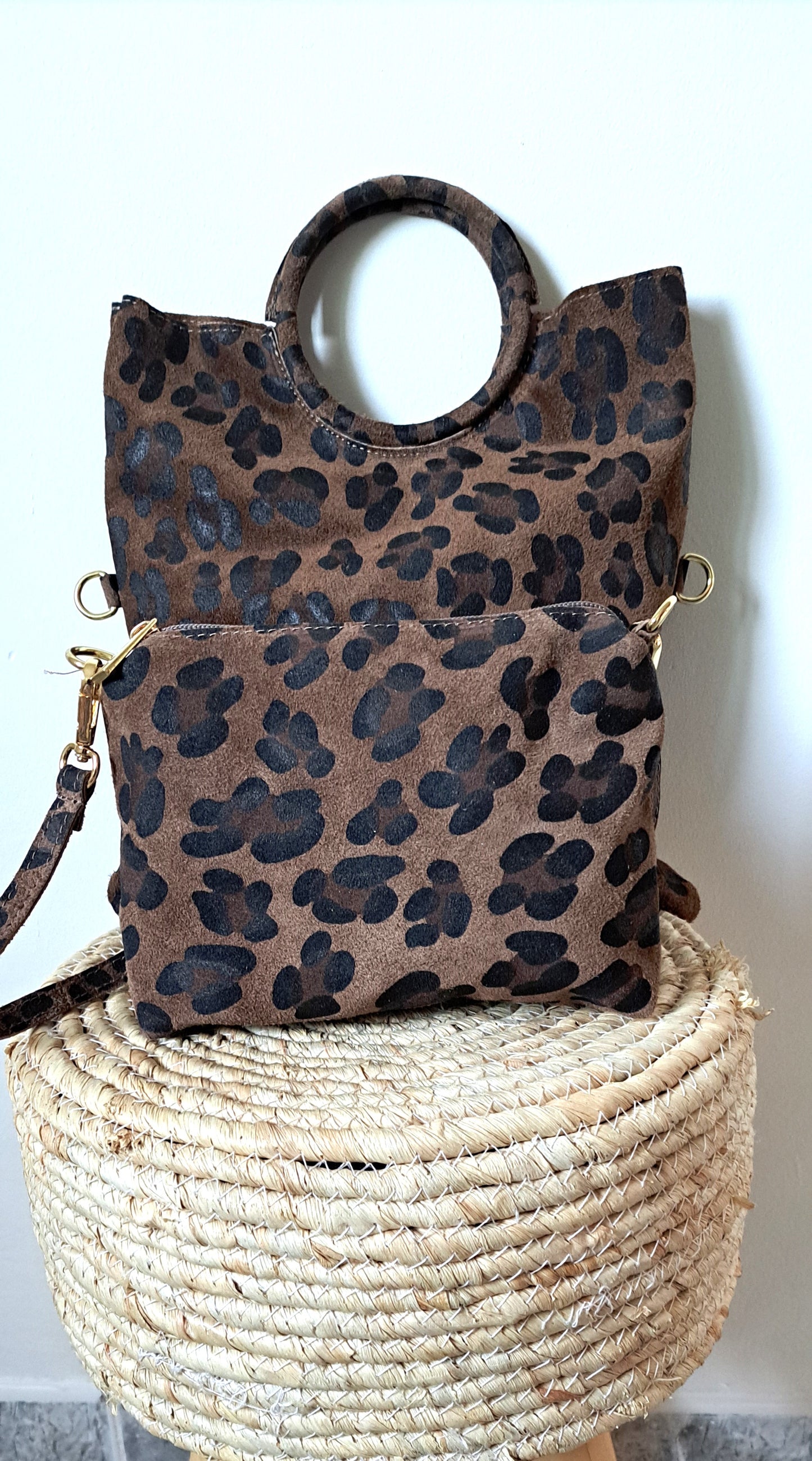 Convertible handbag into animal print shoulder bag