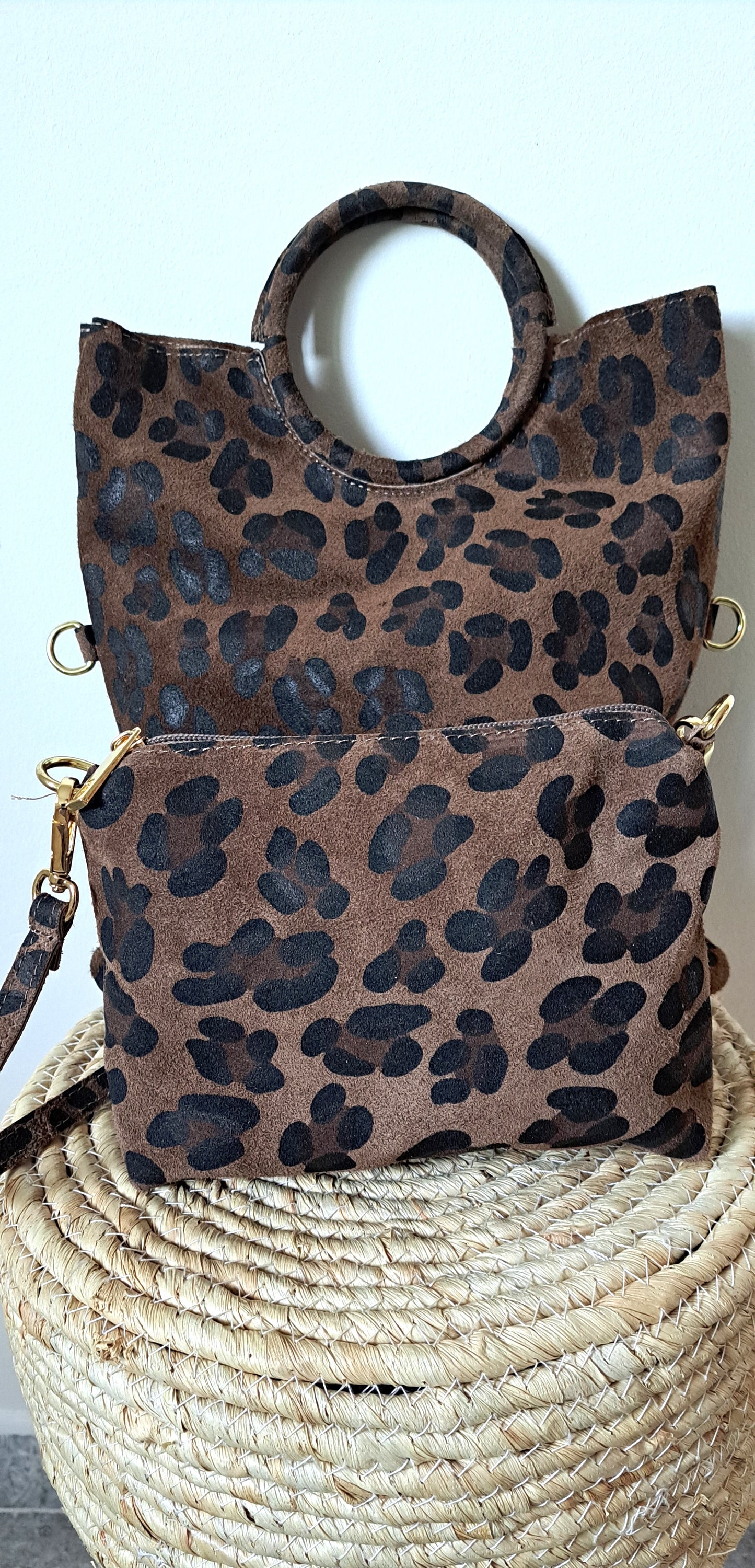 Convertible handbag into animal print shoulder bag