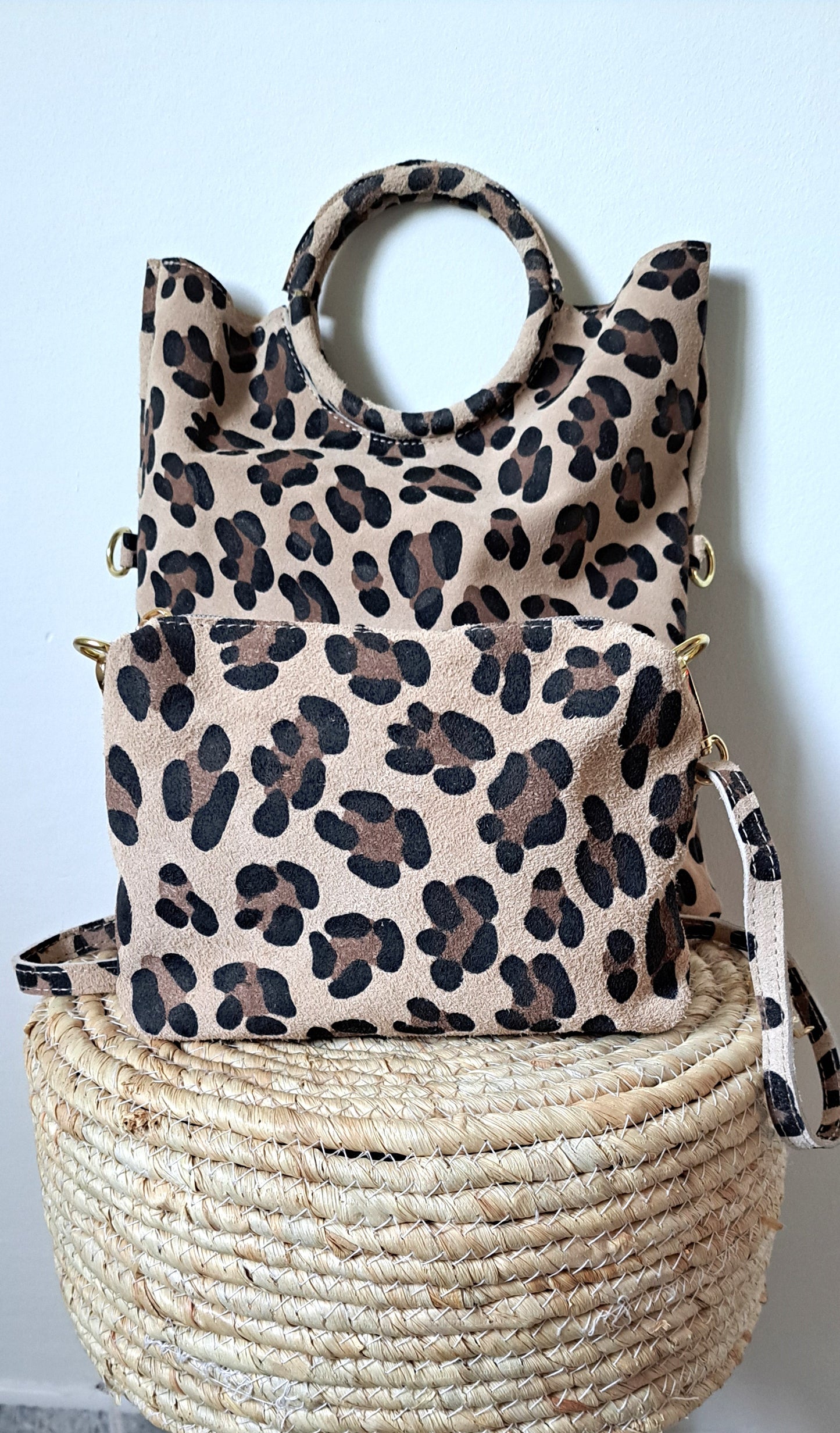 Convertible handbag into animal print shoulder bag