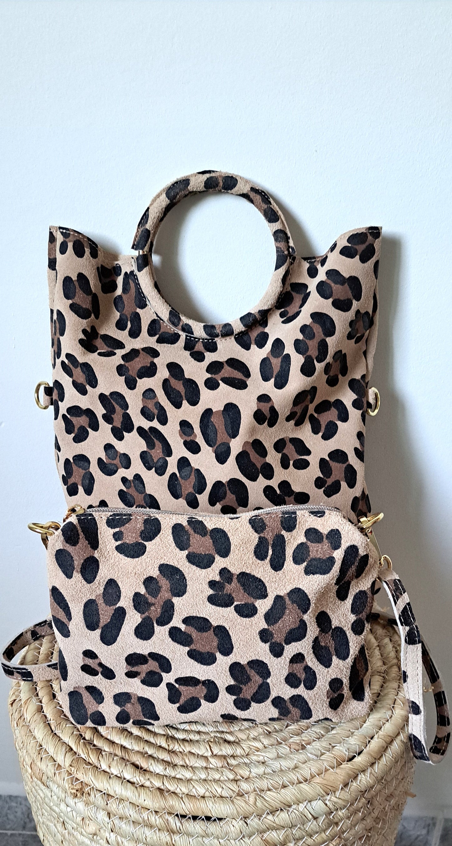 Convertible handbag into animal print shoulder bag