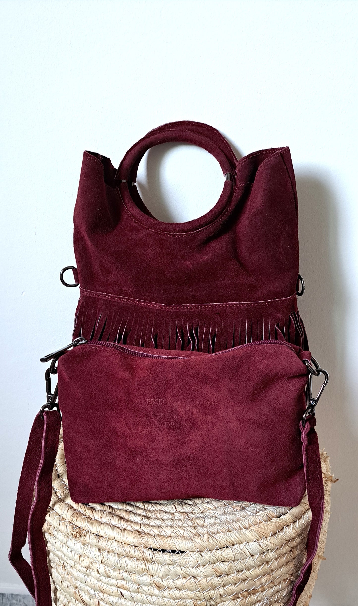 Convertible handbag into a shoulder bag