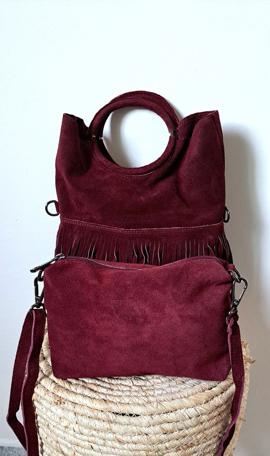 Convertible handbag into a shoulder bag