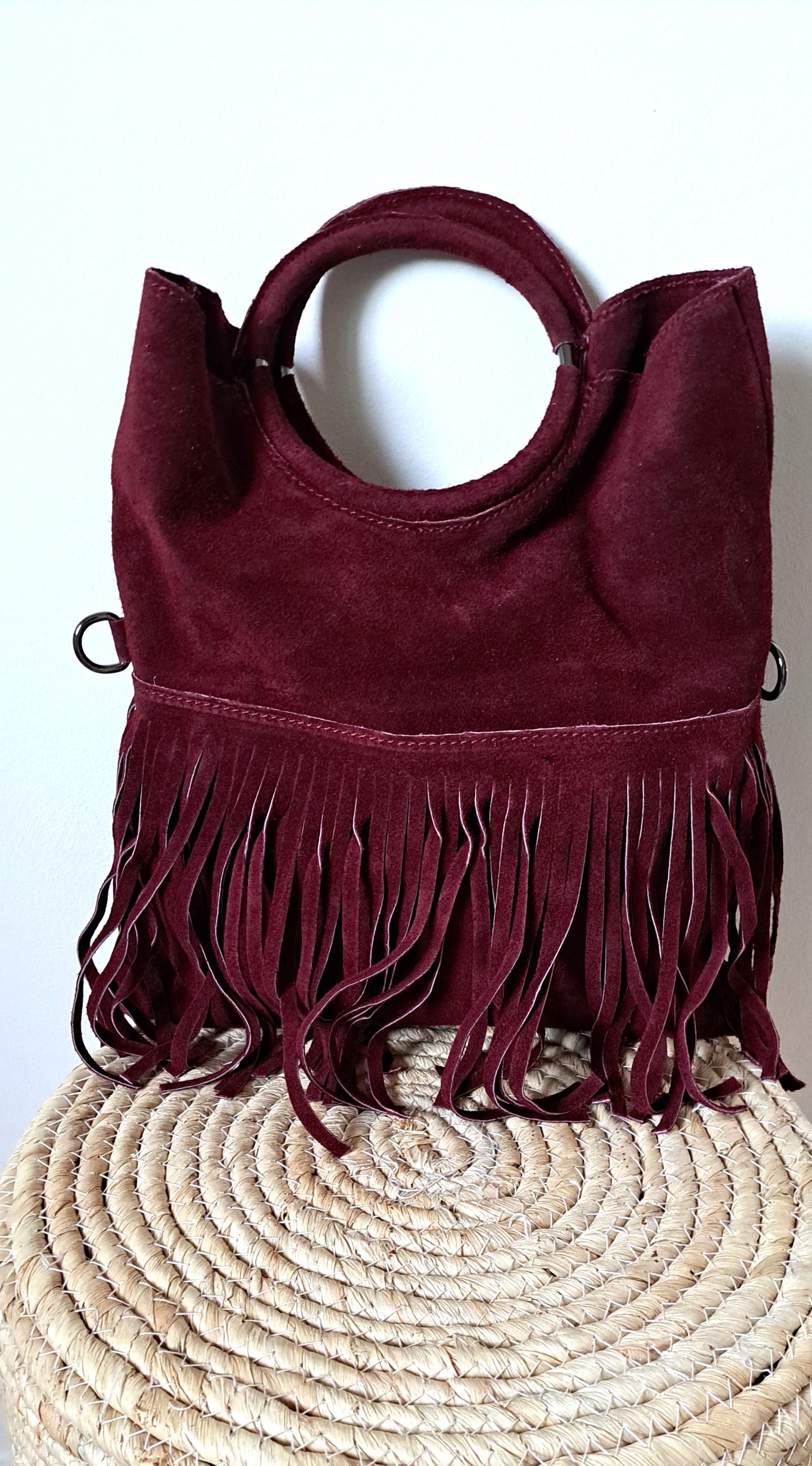 Convertible handbag into a shoulder bag