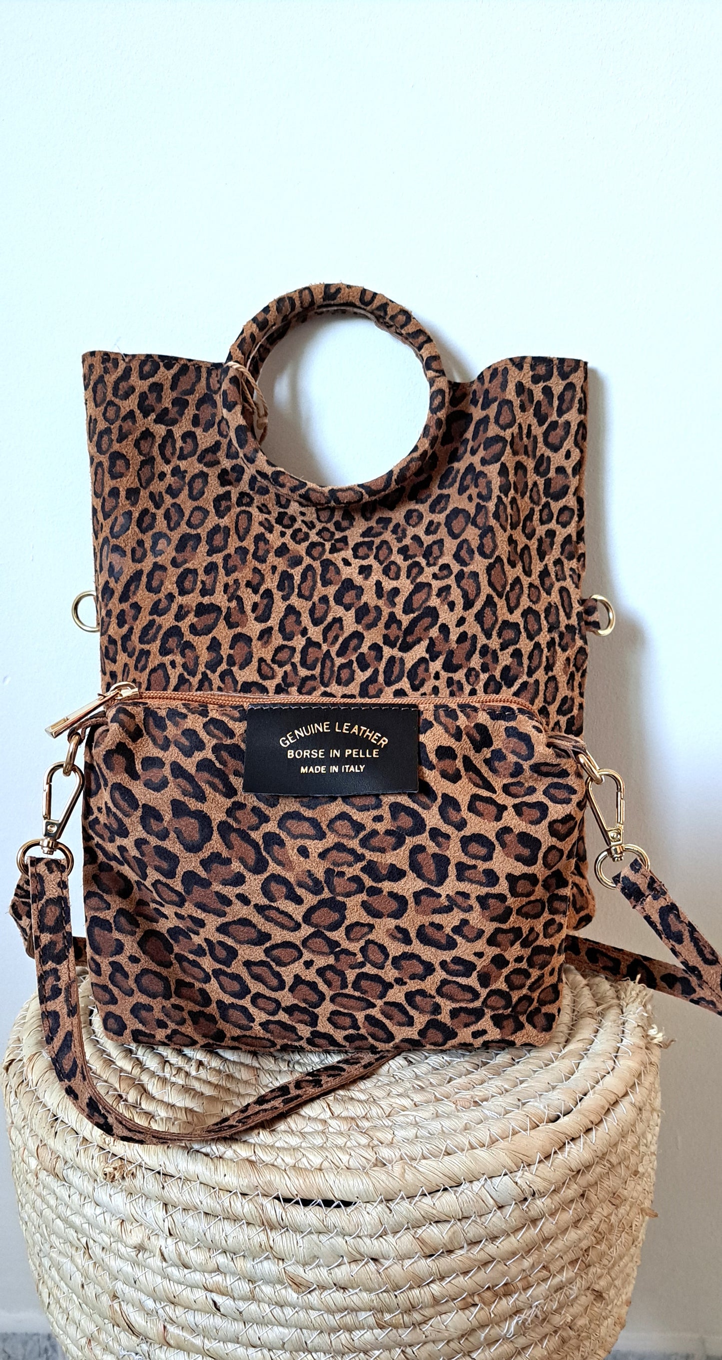 Convertible handbag into animal print shoulder bag