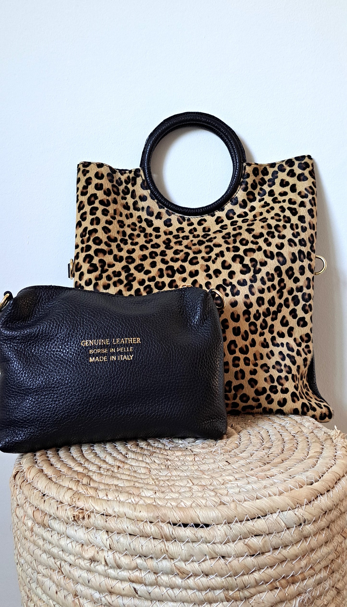 Convertible handbag into animal print shoulder bag