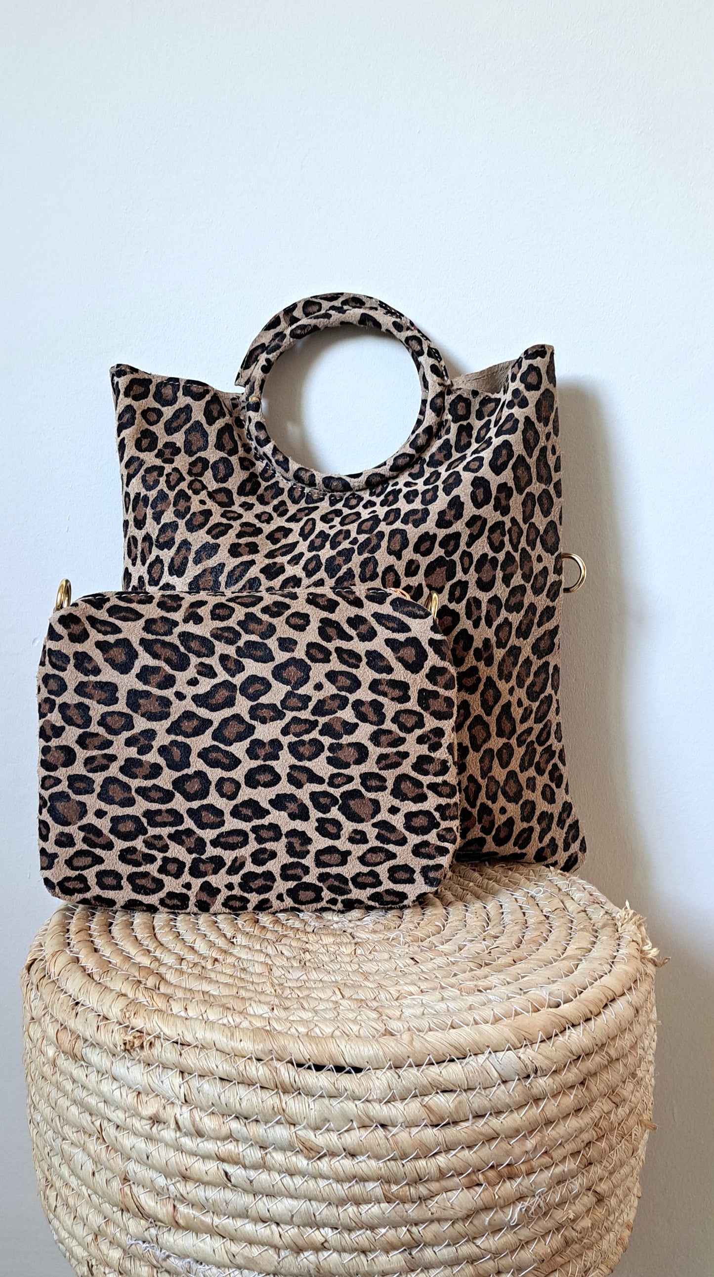 Convertible handbag into animal print shoulder bag