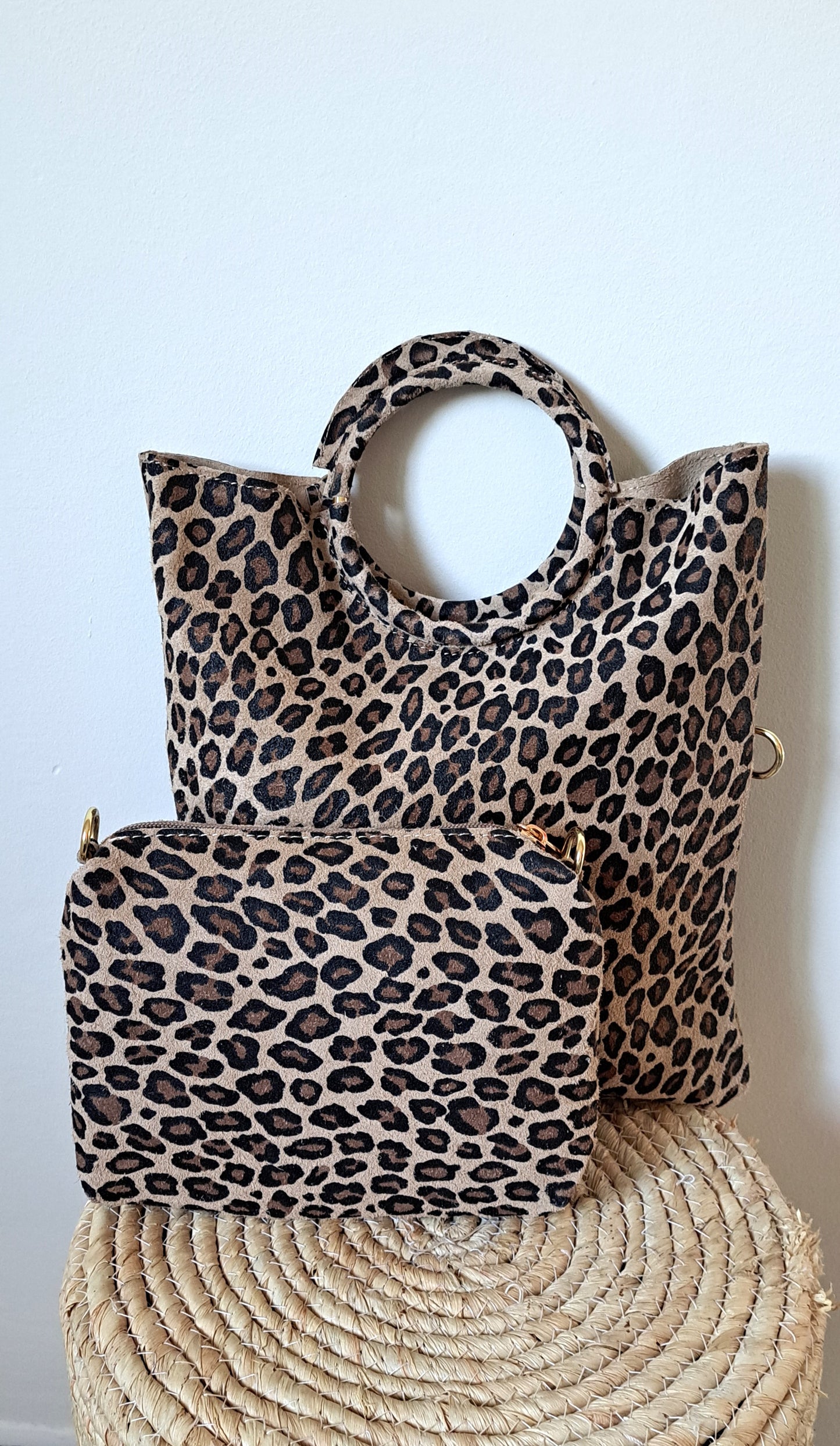 Convertible handbag into animal print shoulder bag